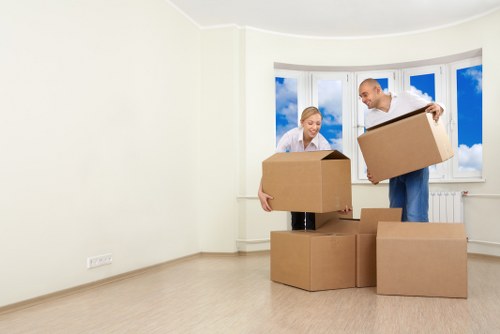 Loading household furniture into a removals van near Crystal Palace streets