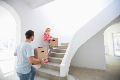 Packed boxes and furniture ready for local removal services
