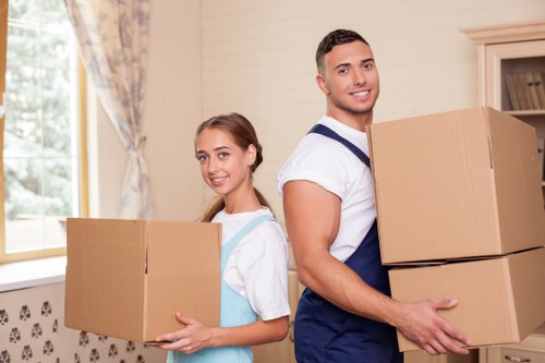 Packed office furniture and equipment ready for relocation
